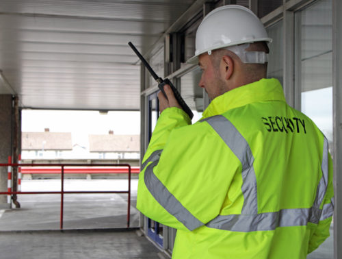 security man talking into a walkie talkie